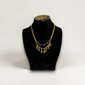 Handmade Trinkets personalised gold letter name necklace with pearl chain, featuring gold-tone letter charms spelling 'KAIAH' on a delicate pearl chain.